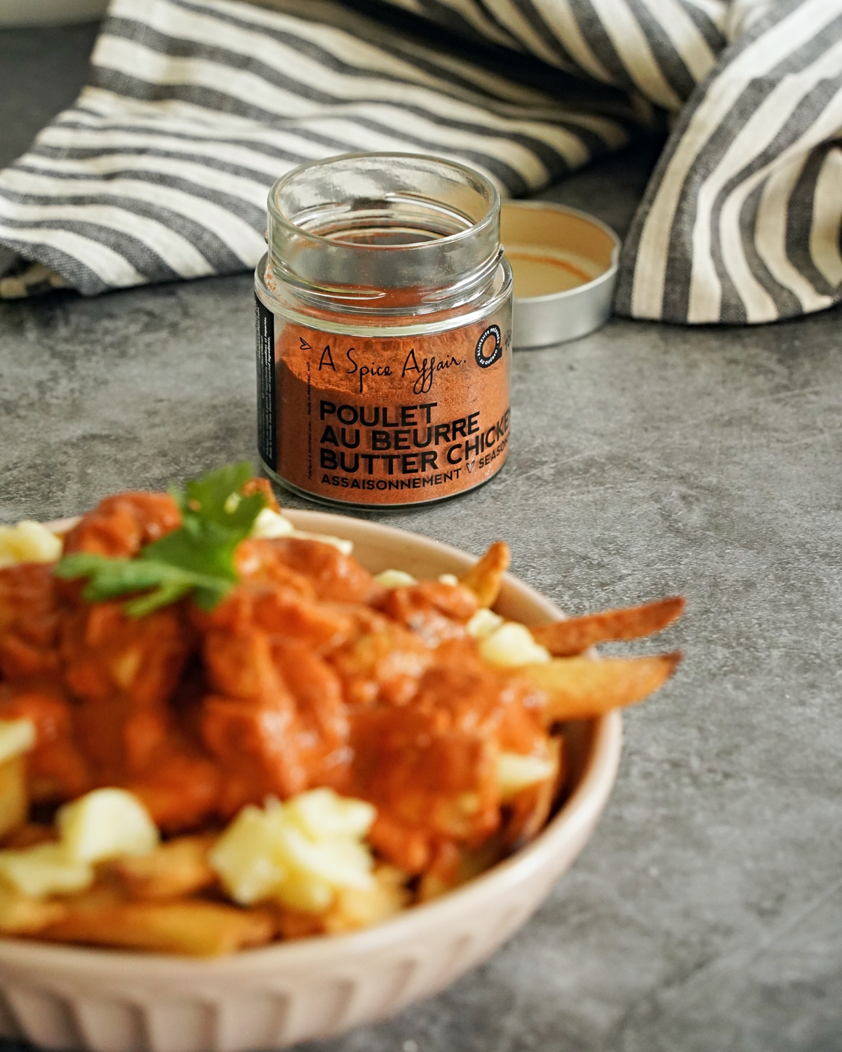 BUTTER CHICKEN POUTINE