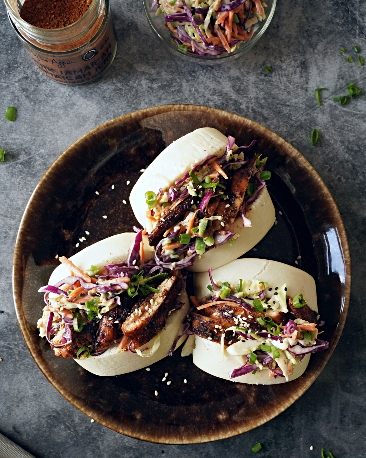 JERK CHICKEN BAOS WITH JALAPEÑO COLESLAW