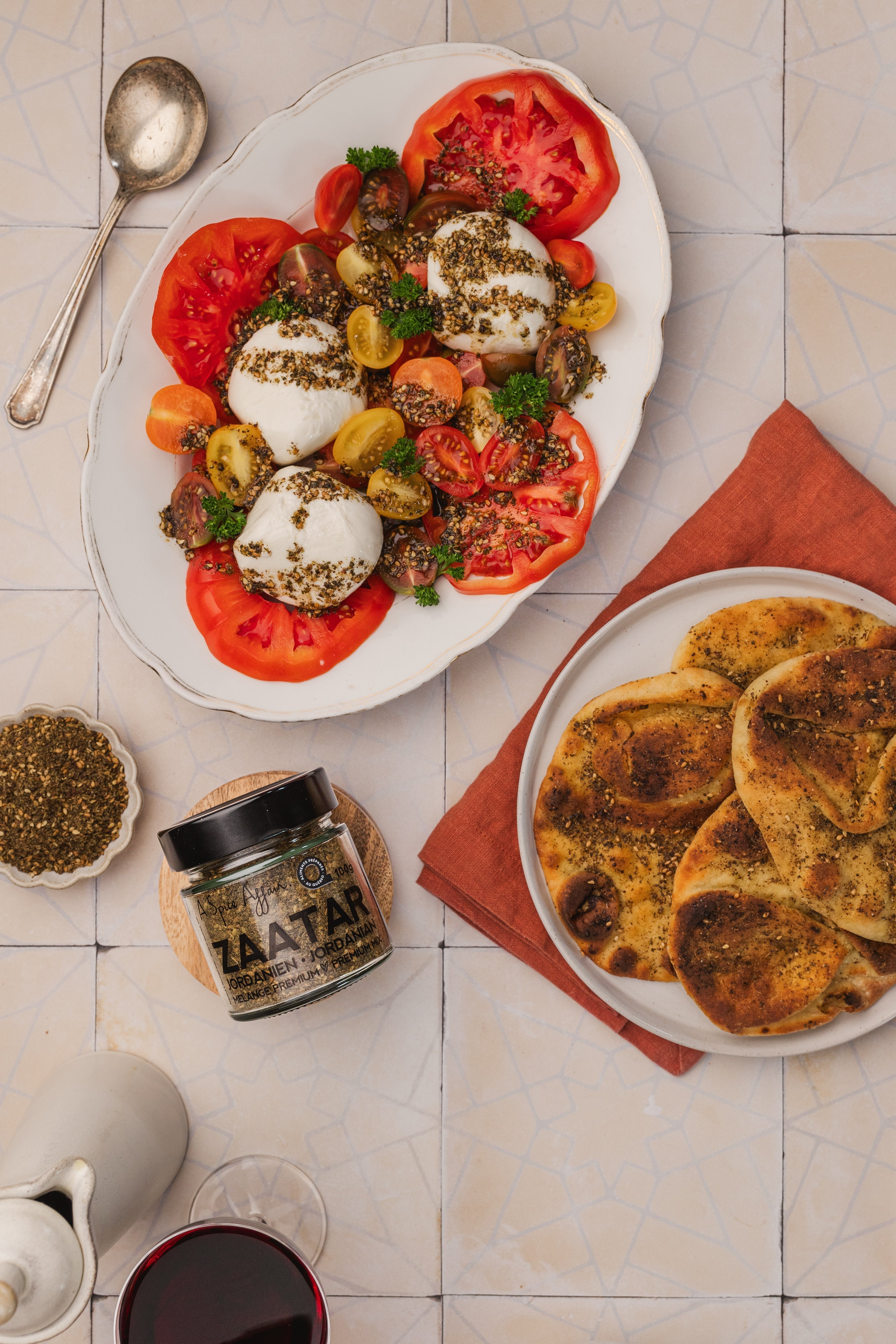 TOMATO & BURRATA SALAD WITH ZAATAR OIL AND CRISPY PITA BREAD